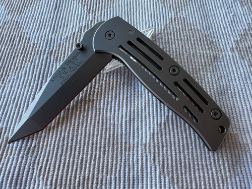 Smith wesson w a - smith,