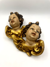 Paar geflügelte Engelsköpfe