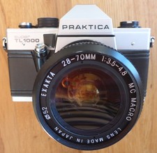 Analoge SLR Praktica TL1000 Super mit neuwertigem Exacta 28-70 Zoom