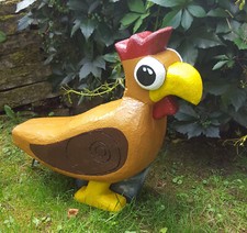 3D Tier sitzendes buntes Huhn