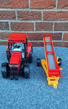 Verkaufe einen CASE 5150 mit einem Förderband von Bruder.