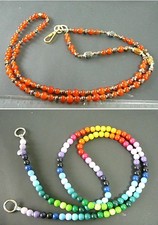 Handyketten  A) Holzperlen bunt 143 cm   B) edle Perlen orange gold 120 cm