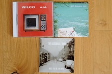 Wilco CD: A.M. (plus 2 Miserable Rich Promo CDs)