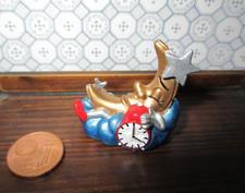 Vintage mondfigur mit uhr - mit,