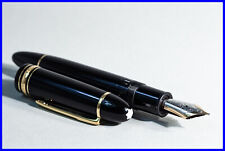 MEISTERSTÜCK 149 MONTBLANC Kolbenfüller Schwarz & Gold mit Medium 14c Feder