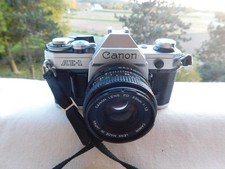 Canon AE-1 mit Lens FD 50mm  1:1.8.Objektiv.Analoge Spigelreflex-Kamera ausJapan