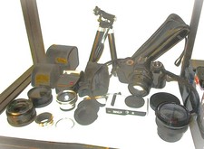 Konvolut - Kameras,  Objektive, Linsen, kleines Stativ + Hüllen