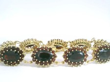 Granatarmband 333er 8K Gelbgold ca. 20cm mit 9 Granat