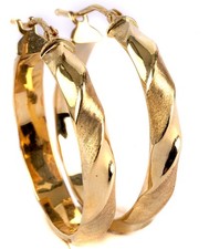 neuer Design Ohrschmuck aus 375 Gold - große Creolen gedreht