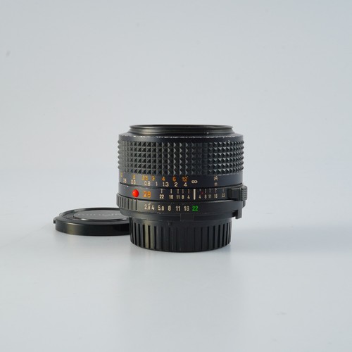 Top minolta new - md, f/2.8