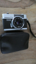 Fotokamera  " C35 " mit Blitz  aus dem Hause " KONICA "