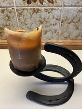 Hufeisen als   Kerzenständer  Maße:14 x 17 x 13cm Gewicht 740gr.