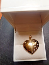 Hübscher Anhäger in Herzform Gelbgold 333 mit 10 Diamanten