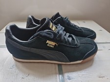 PUMA Roma. Schwartz mit Gold