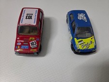 2 x Burago Modellautos Rarität Rennwagen Renault Clio+Fiat Panda 45