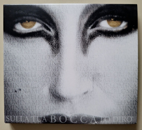 Mina sulla tua bocca lo - tua,