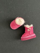 Rosa Lederstiefel mit Fell