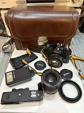 Nikon EM mit Lens Series E 1.8