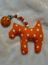 Kinderwagenanhänger Hund orange Sterne Handarbeit Kinderwagenkette