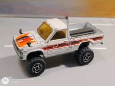 Spielzeugauto Majorette Toyota Pick-Up Truck 4x4 No. 287 - 1:56 weiß, hoch