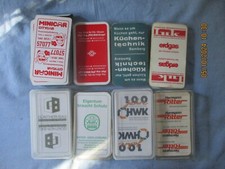 Acht verschiedene Schafkopf-Kartenspiele mit teils älterer Werbung aus FRANKEN,