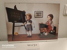 Puppenbild im  Bilderrahmen