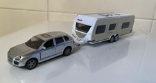 Siku 2542-Porsche Cayenne mit
