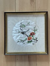 filigranes Stickbild Vogel auf