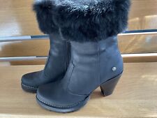 Schicke schwarze Stiefeletten