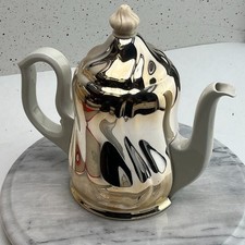 Porzellan Teekanne mit Metall-Mantel / Isolierkanne