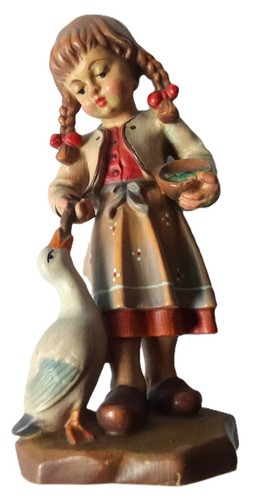 Mädchen füttert eine gans - füttert,