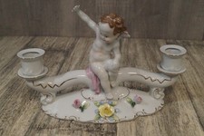 Antiker Kerzenleuchter aus Porzellan Amor Knabe