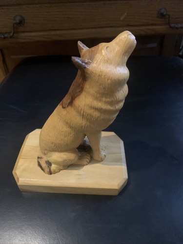 Skulptur aus olivenholz - aus,