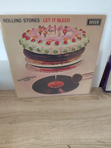 The rolling stones let it - -,