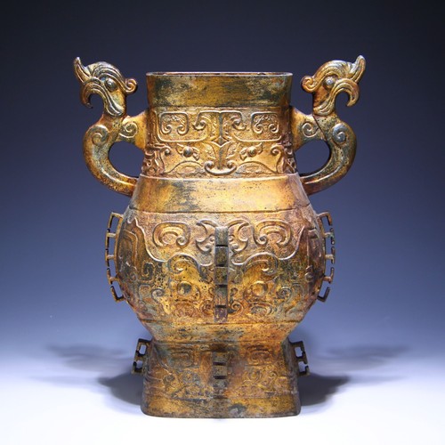 Gilt painted archaistic metal - gilt,
