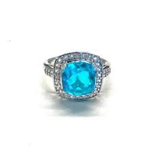 Ring  925er Silber Paraiba Quarz blautürkis, umrahmt von Weißtopasen