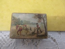 um 1910 Kaufmannsladen/Puppenstube Miniatur Dose mit Bild : pflügender Bauer