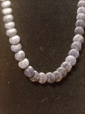 Kette blauer Stein, Linsen