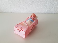 Altes Püppchen in rosa