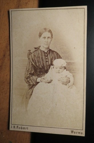 Sitting woman with baby - sitting,