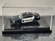 Ricko / Busch - 38868 - H0 - 1:87 -  Dodge Charger Police-  in Vitrinenbox