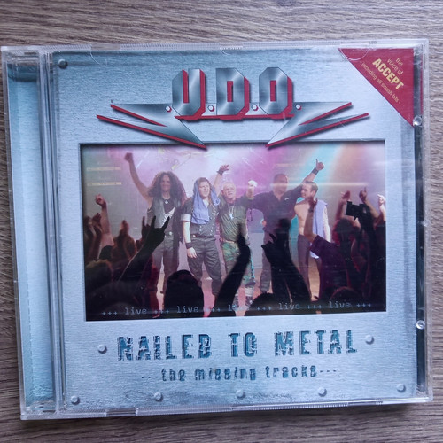 Nailed to metal the - nailed,