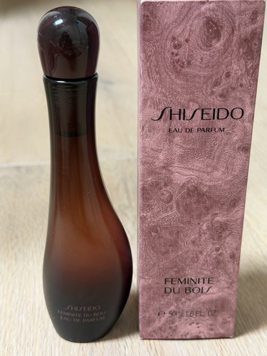 Feminite bois eau de - ,