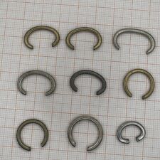 9 Bügel für Taschenuhren aus Uhrmachernachlass #24