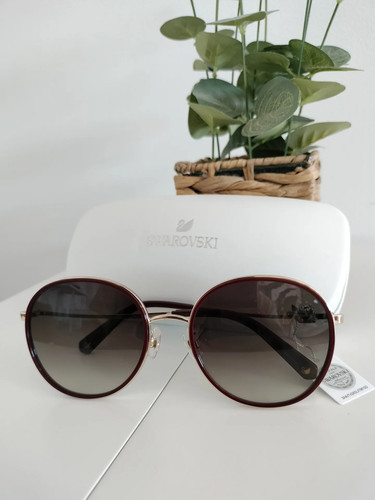 Gafas sol redondas oscuras - de,
