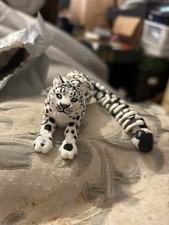 Bewegliche Schneeleopard Figur