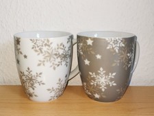 2 Tassen aus Porzellan mit Schneeflocken-Motiv  von home by Tchibo