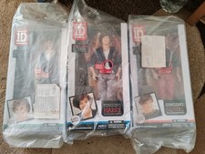 One Direction singende Puppen