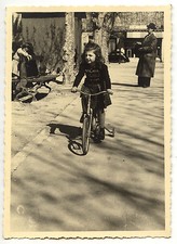 Little girl on bike square