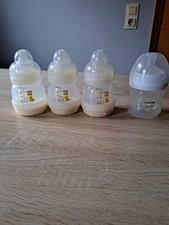 Babyflaschen und Sauger mit Deckel von MAM 3x und Phillips Avent X1